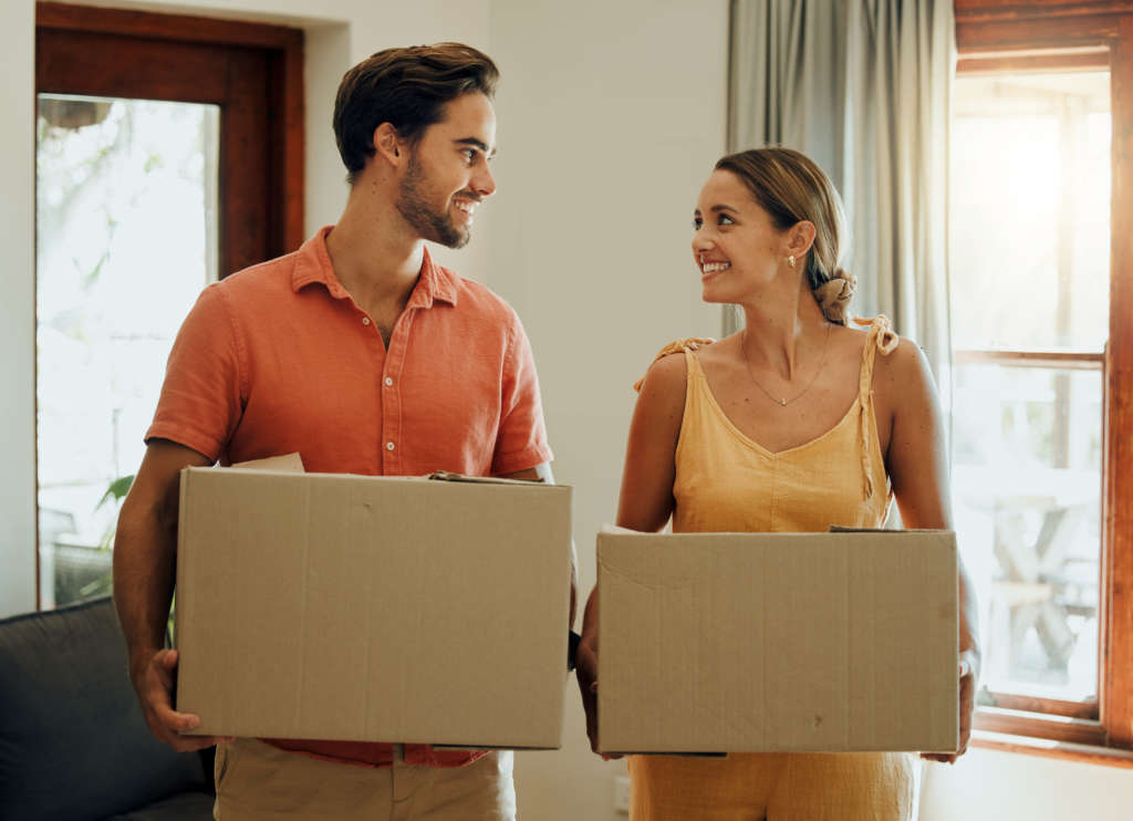 Happy couple preparing for movers